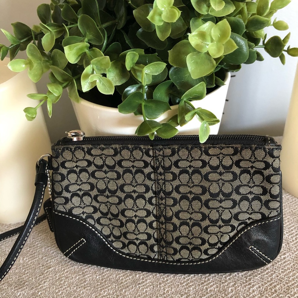 Coach signature wristlet.